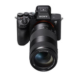 Sony FE 100-400mm F5.6-8 OSS mounted on a Sony a7 V, front top view