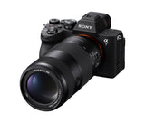 Sony FE 100-400mm F5.6-8 OSS mounted on a Sony a7 V, right side view