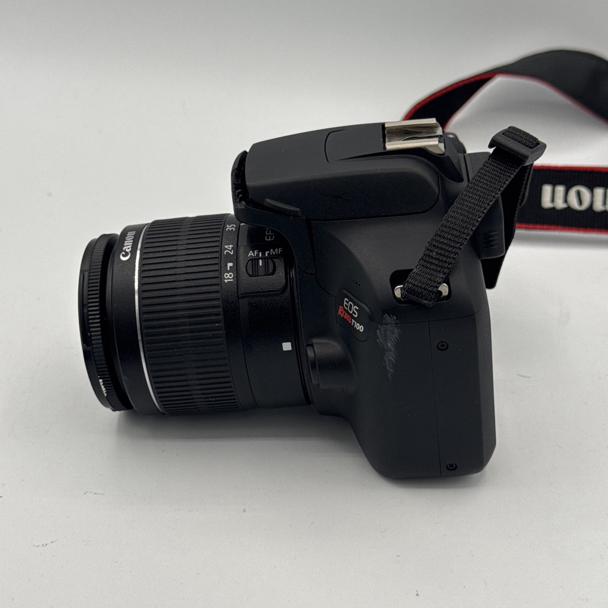 Used Canon EOS Rebel T100 with EF-S 18-55mm F3.5-5.6 III Lens Camera